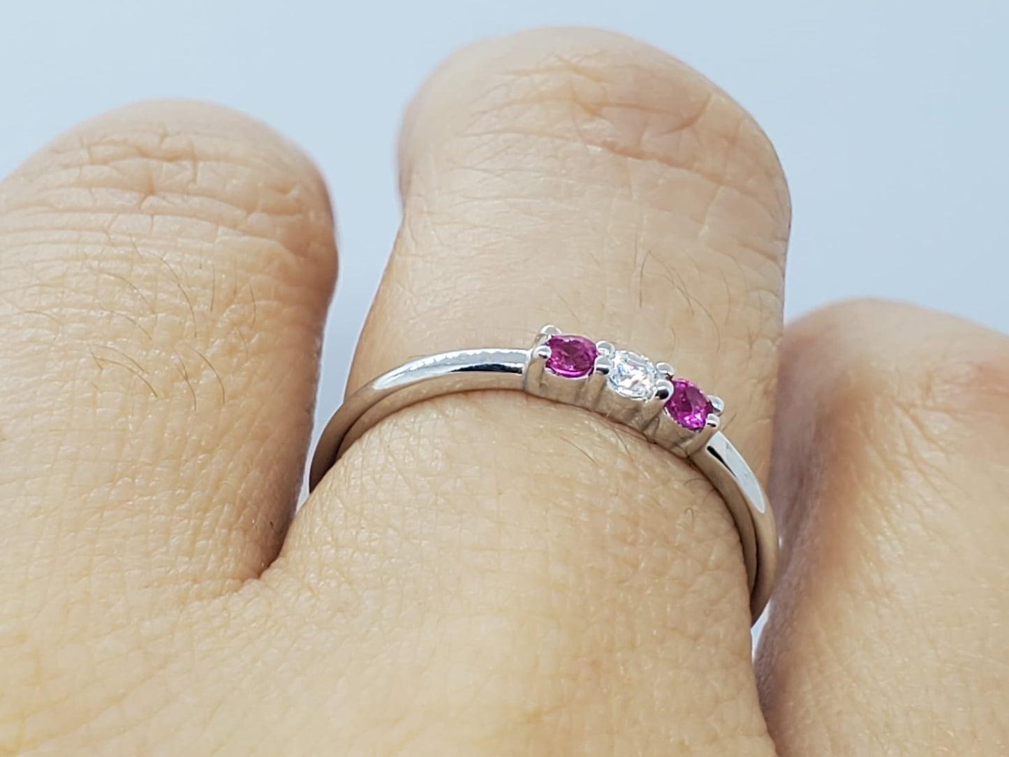 14k white gold ring, with 1 Diamond and 2 Ruby stones, very comfortable and elegant