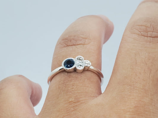 14k white gold ring, it has 3 Diamonds and 1 Natural Sapphire, for daily use and comfortable